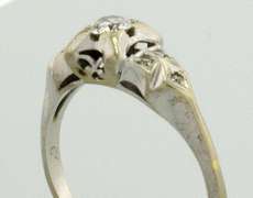 White Gold Filligree Ring with .25 CTW Diamonds