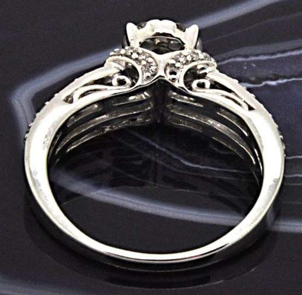 LADIES 14 KT WHITE GOLD DIAMOND RING.