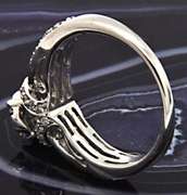 LADIES 14 KT WHITE GOLD DIAMOND RING.