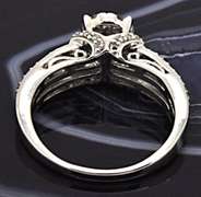 LADIES 14 KT WHITE GOLD DIAMOND RING.