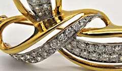 18 KT YELLOW AND WHITE GOLD DIAMOND BROOCH.