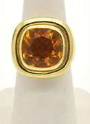 LADIES 18 KT YELLOW GOLD LARGE TOPAZ RING.