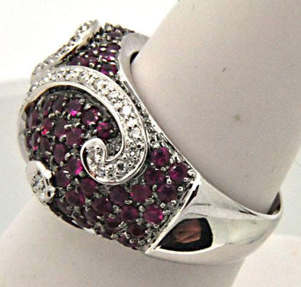 LADIES 18 KT WHITE GOLD RUBIES AND DIAMOND RING.