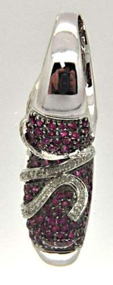LADIES 18 KT WHITE GOLD RUBIES AND DIAMOND RING.