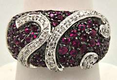 LADIES 18 KT WHITE GOLD RUBIES AND DIAMOND RING.