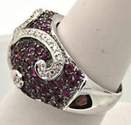 LADIES 18 KT WHITE GOLD RUBIES AND DIAMOND RING.