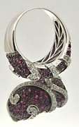 LADIES 18 KT WHITE GOLD RUBIES AND DIAMOND RING.