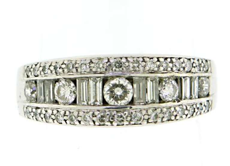 Romantic Round Brilliant and Baguette Diamond Ring