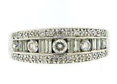 Romantic Round Brilliant and Baguette Diamond Ring