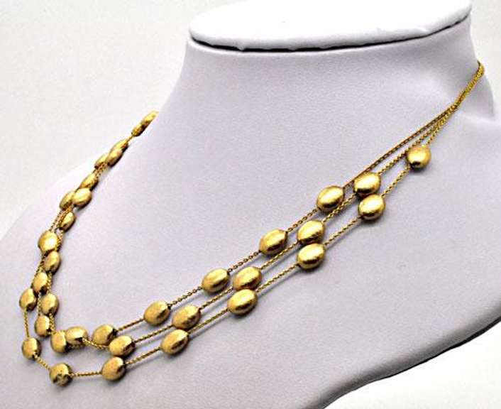 14 KT SOLID GOLD STATION NECKLACE.