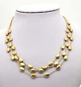 14 KT SOLID GOLD STATION NECKLACE.