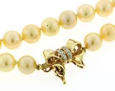 Golden Peach Pearl Necklace with Bow Clasp & Spacers