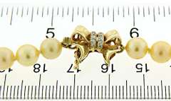 Golden Peach Pearl Necklace with Bow Clasp & Spacers