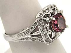 LADIES 14KT WHITE GOLD TOURMALINE RING.