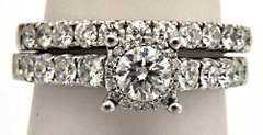 LADIES 14KT WHITE GOLD DIAMOND WEDDING BAND.