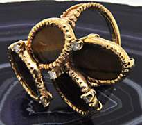 LADIES 14 KT YELLOW GOLD DIAMOND AND TIGER'S EYE RING.