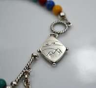 Signed Southwest 825 Sterling and Different Color Gemstones Bracelet