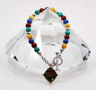 Signed Southwest 825 Sterling and Different Color Gemstones Bracelet