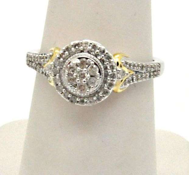 14KT WHITE GOLD DIAMOND RING WITH YELLOW GOLD ACCENTS.
