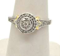 14KT WHITE GOLD DIAMOND RING WITH YELLOW GOLD ACCENTS.
