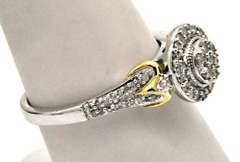 14KT WHITE GOLD DIAMOND RING WITH YELLOW GOLD ACCENTS.