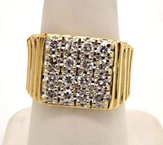 MEN'S 14KT GOLD DIAMOND RING.