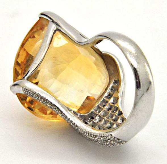 LADIES 18KT WHITE GOLD CITRINE AND DIAMOND RING.