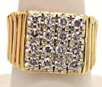 MEN'S 14KT GOLD DIAMOND RING.