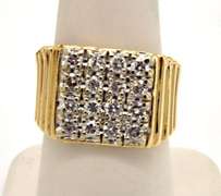 MEN'S 14KT GOLD DIAMOND RING.