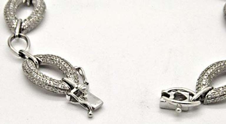 LADIES 14KT WHITE GOLD DIAMOND LINK BRACELET.