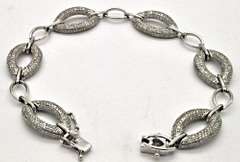 LADIES 14KT WHITE GOLD DIAMOND LINK BRACELET.