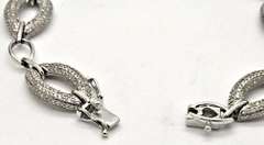 LADIES 14KT WHITE GOLD DIAMOND LINK BRACELET.