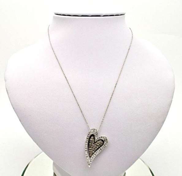 14KT GOLD HEART PENDANT/W WHITE AND CHOCOLATE DIAMONDS.