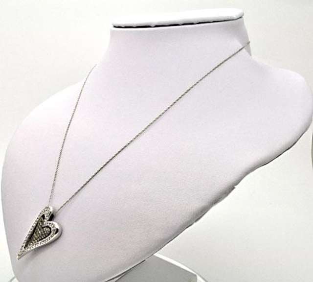14KT GOLD HEART PENDANT/W WHITE AND CHOCOLATE DIAMONDS.