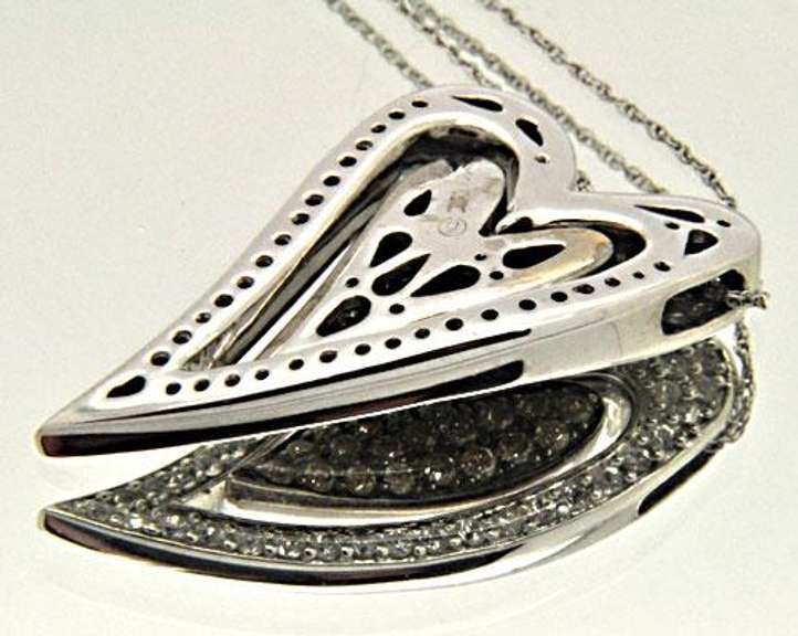 14KT GOLD HEART PENDANT/W WHITE AND CHOCOLATE DIAMONDS.