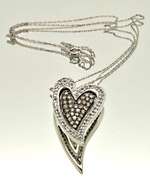 14KT GOLD HEART PENDANT/W WHITE AND CHOCOLATE DIAMONDS.