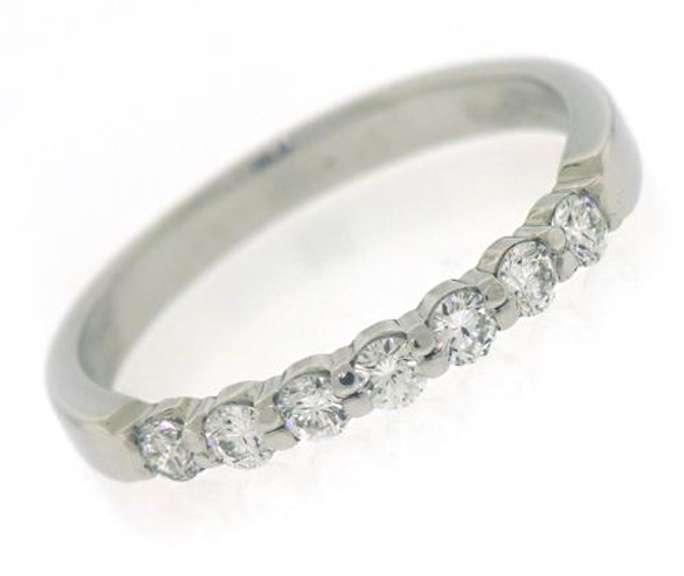 Elegant Platinum Shared Prong Diamond Band