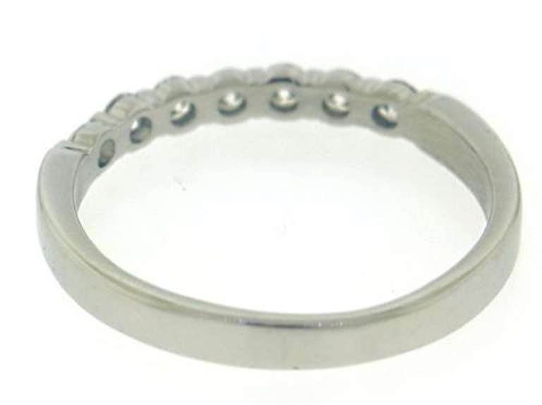 Elegant Platinum Shared Prong Diamond Band