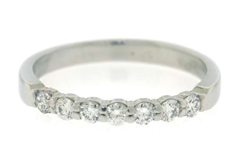 Elegant Platinum Shared Prong Diamond Band