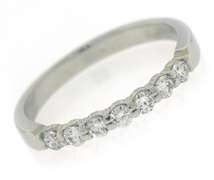 Elegant Platinum Shared Prong Diamond Band
