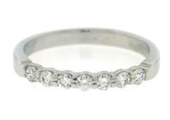 Elegant Platinum Shared Prong Diamond Band
