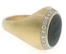 Excellent 14kt YG Black Onyx with Diamond Halo Ring