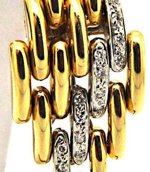 18KT YELLOW AND WHITE GOLD DIAMOND LINKS EARRING.
