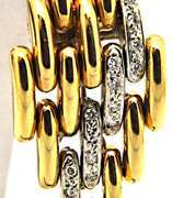 18KT YELLOW AND WHITE GOLD DIAMOND LINKS EARRING.