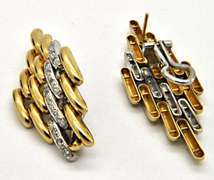 18KT YELLOW AND WHITE GOLD DIAMOND LINKS EARRING.