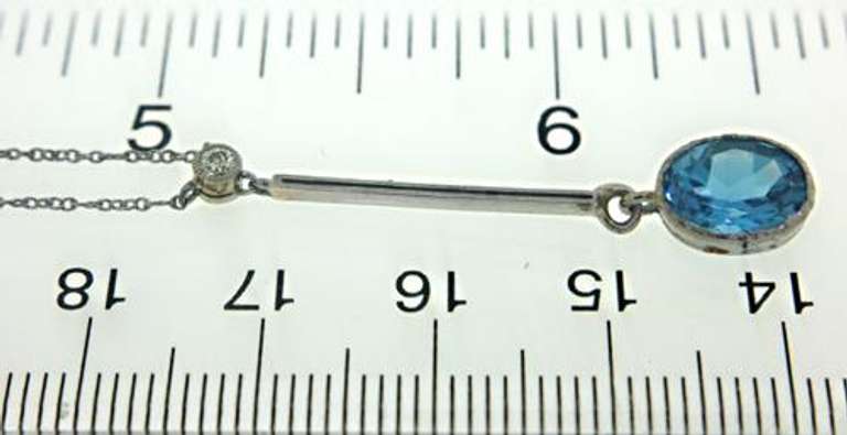 Lovely 14kt WG Blue Topaz and Diamond Drop Necklace