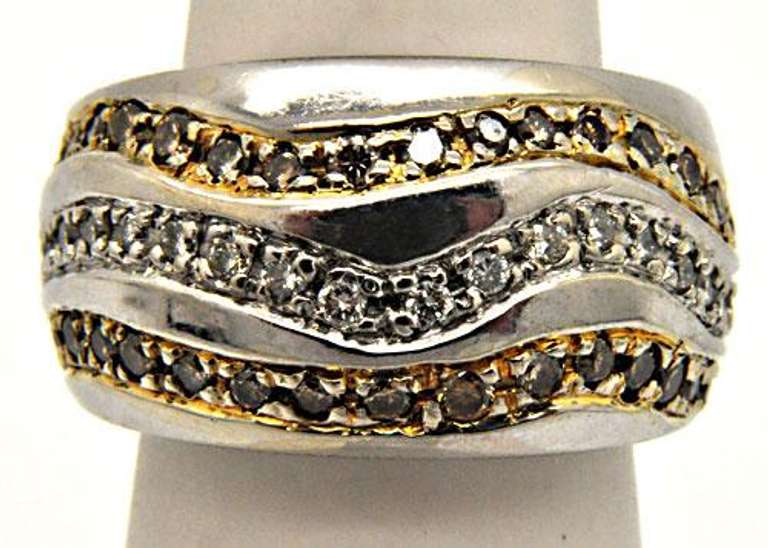 LADIES 14KT WHITE GOLD DIAMOND BAND.