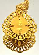 21KT SOLID GOLD SINGAPORE CHAIN WITH 21KT PENDANT.