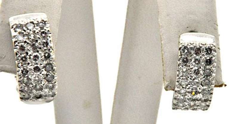 14K WHITE GOLD DIAMOND EARRINGS.