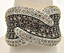 LADIES 14K GOLD WITH WHITE AND CHOCOLATE DIAMONDS.